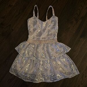 House of Wallace white and silver mini dress.